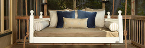 Arranging Pillows On Porch Swings - Charleston, SC