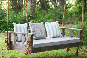 How Does a Bed Swing Differ from a Traditional Porch Swing?
